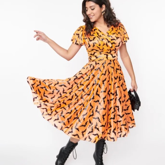 Magnolia Place Dresses & Skirts - Orange Bat Print Midi Dress
